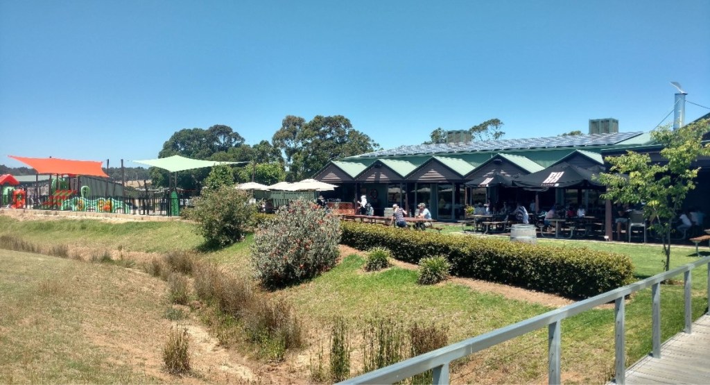 Outdoor seating area and children's playground at Cheeky Monkey Brewing Co, Margaret River