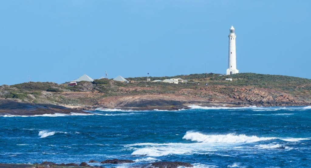 Cape Leeuwin Lighthouse with the ocean in front of it